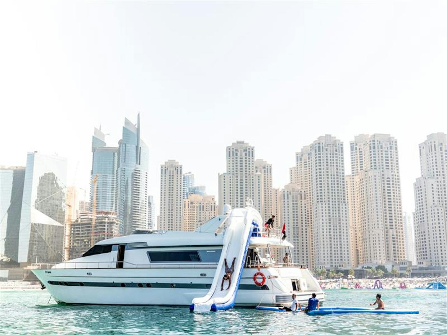 4-Hour Yacht Cruise in Dubai Marina with BBQ Lunch & Inflatable Slide