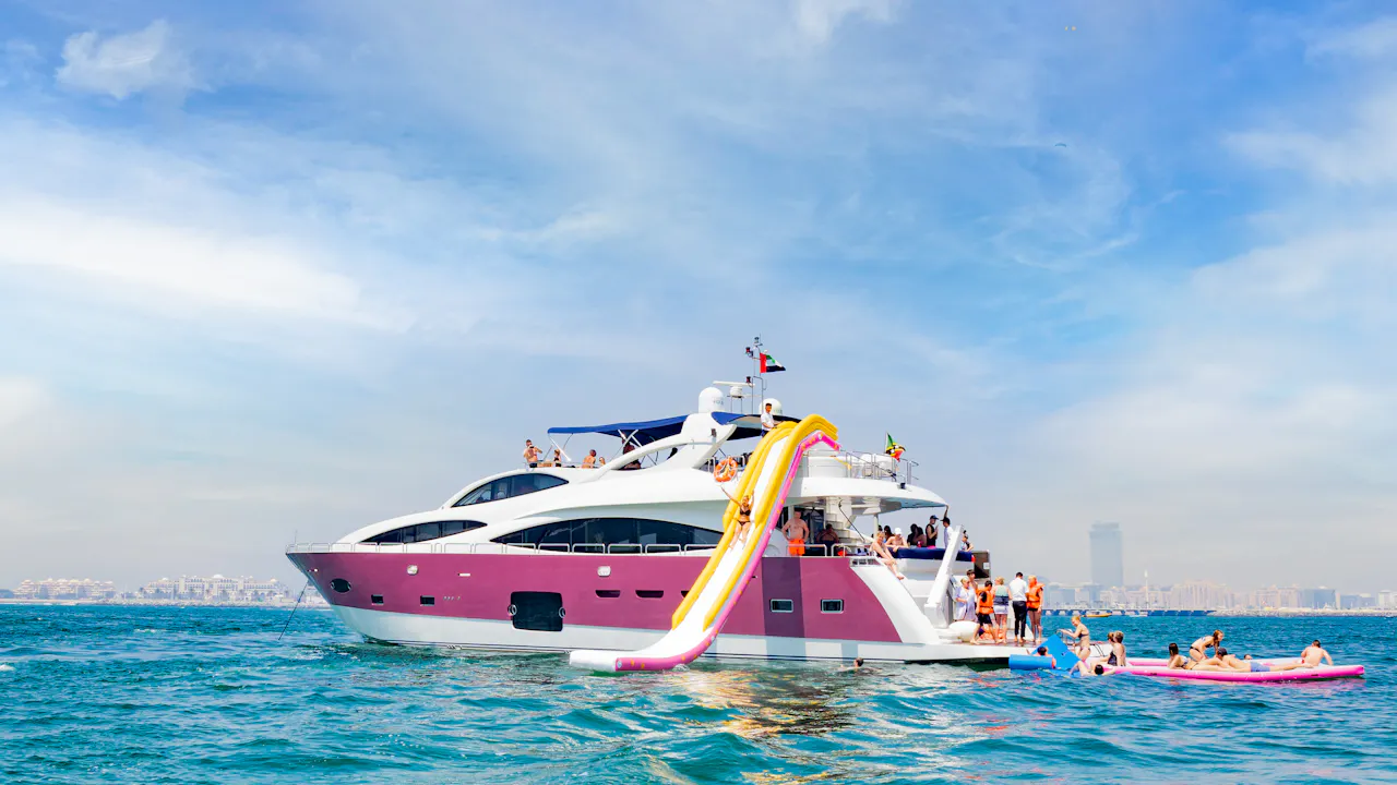 4-Hour Yacht Cruise in Dubai Marina with BBQ Lunch & Inflatable Slide