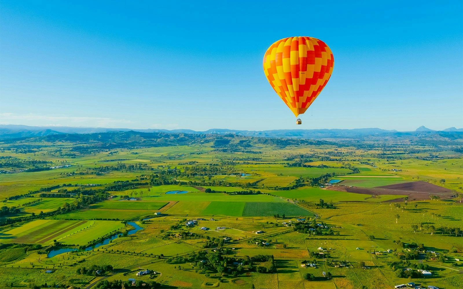 Cairns Sunrise Hot Air Balloon Flight with Sparkling Wine + Transfer
