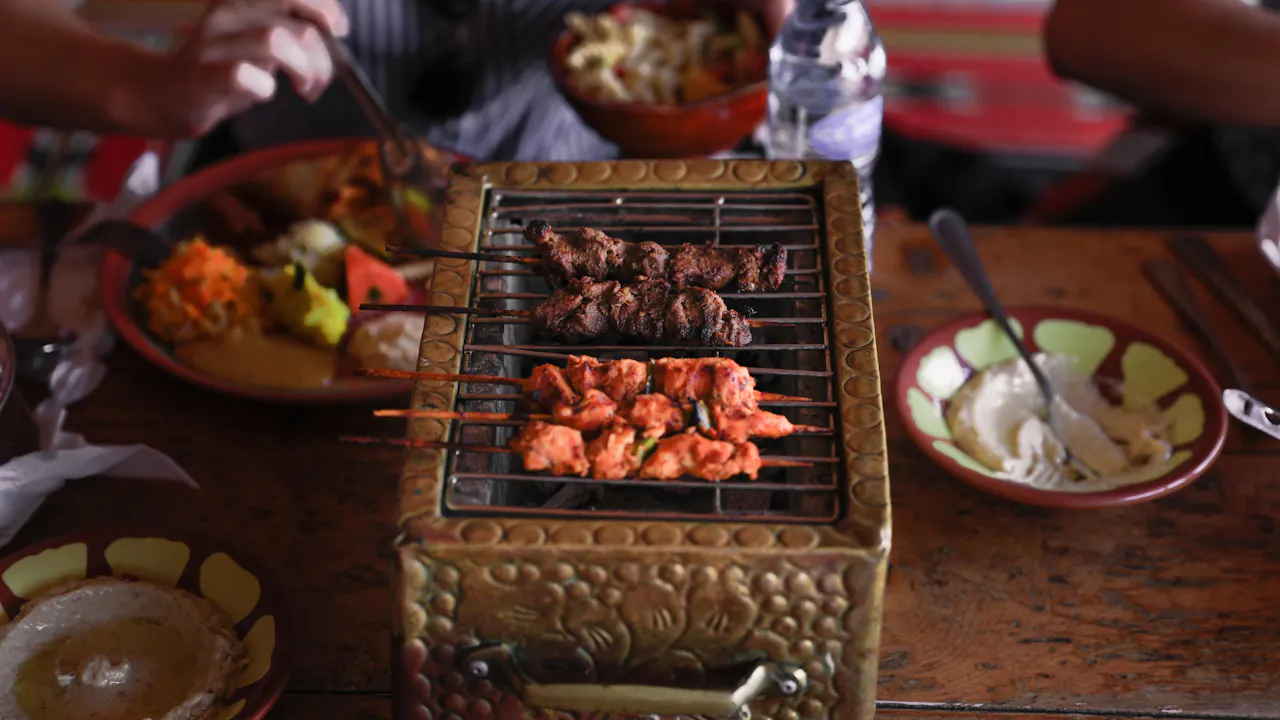 Premium Red Dunes by Quad Bike, Camel Ride, Sandboarding and BBQ Discount