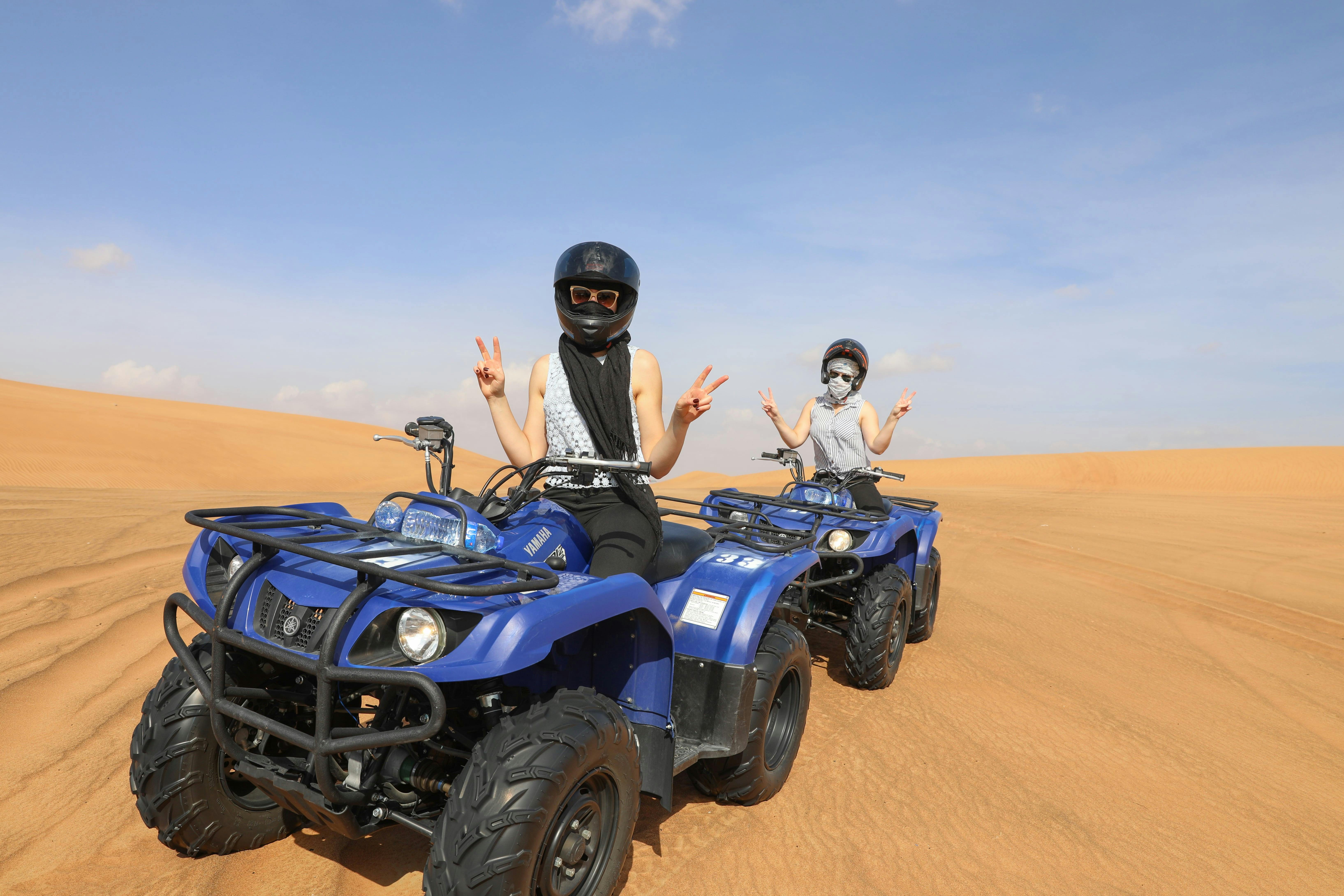 Premium Red Dunes by Quad Bike, Camel Ride, Sandboarding and BBQ 