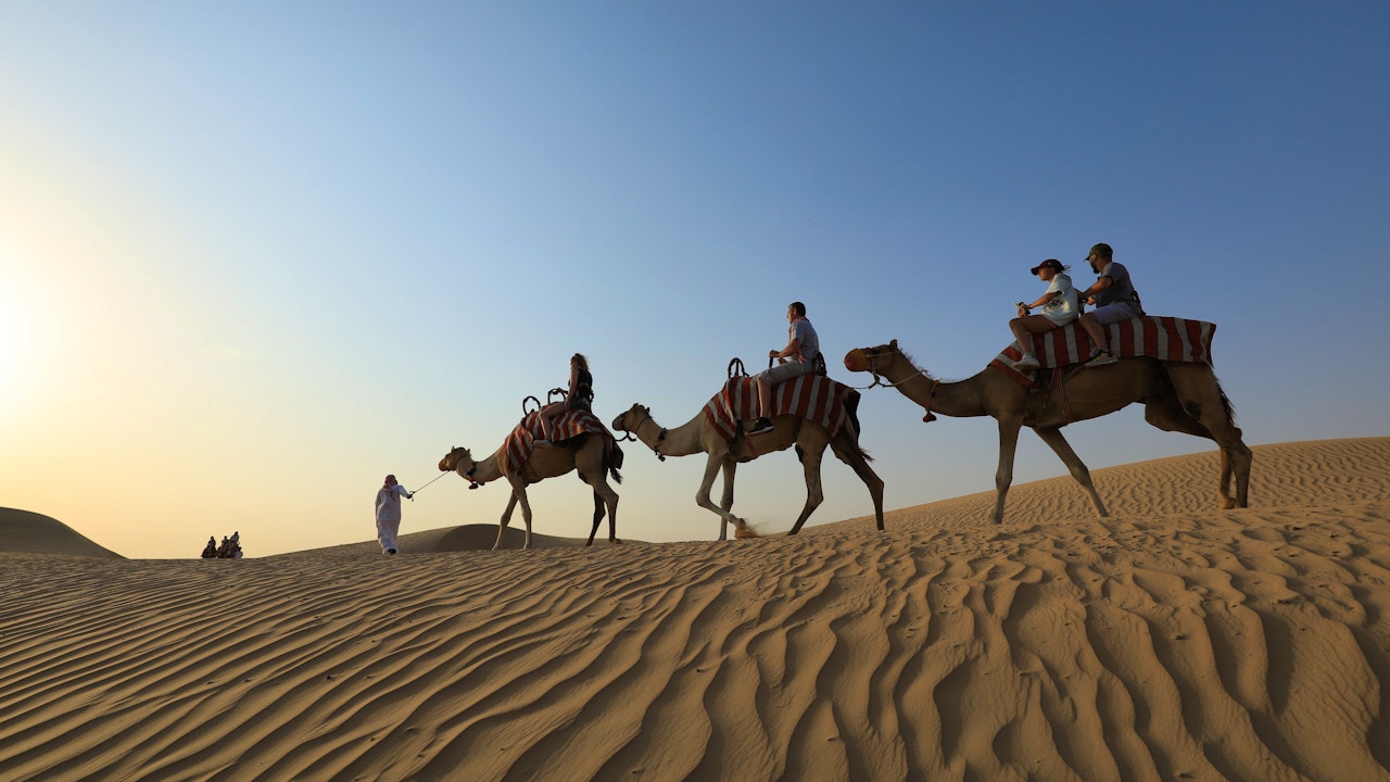 Premium Morning Quad Bike Sandboarding and Camel Ride Price